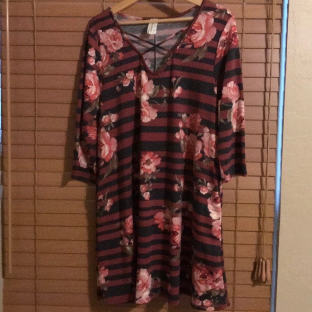 NWOT. Never used criss cross front tunic